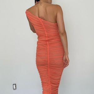 Peach colored ruched one shoulder dress